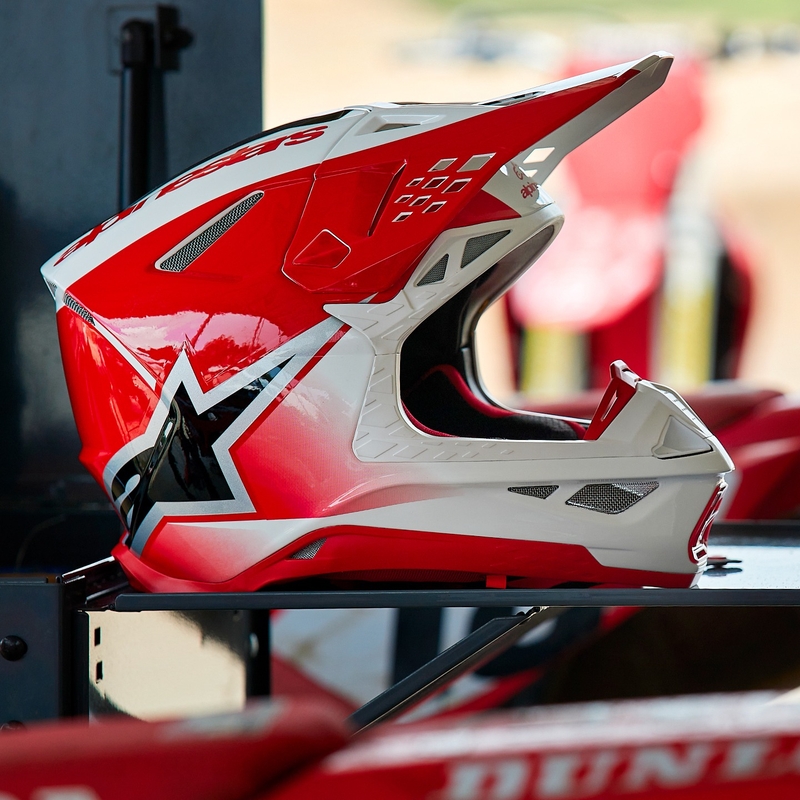Alpinestars Supertech S-M10 Unite motokros čelada rdeče-bela