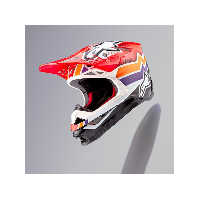 Alpinestars Supertech S-M10 motokros čelada Troy Lee Designs Edition oranžno-rumena-vijolično-bela črna