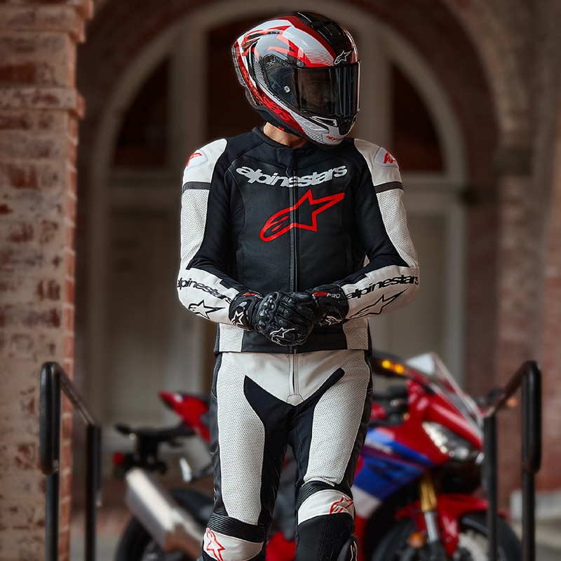 Alpinestars GP Force Lurv usnjena dvodelna obleka bela-črna-fluo rdeča