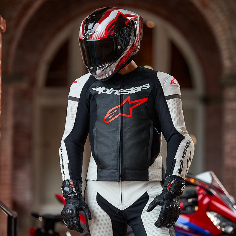 Alpinestars GP Force Lurv usnjena dvodelna obleka bela-črna-fluo rdeča