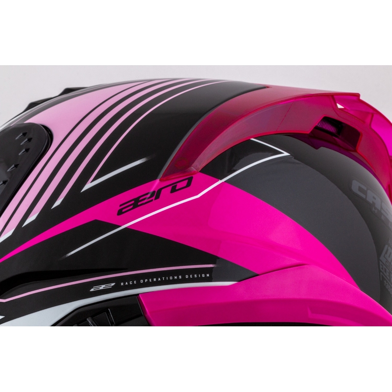 Črno-roza-bela integralna motoristična čelada Cassida Aero Drome