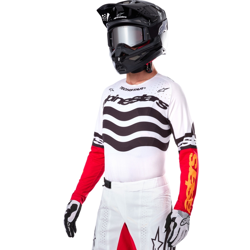 Motokros dres Alpinestars Techstar omejena izdaja temno črno-belo-fluo rdeče-oranžna