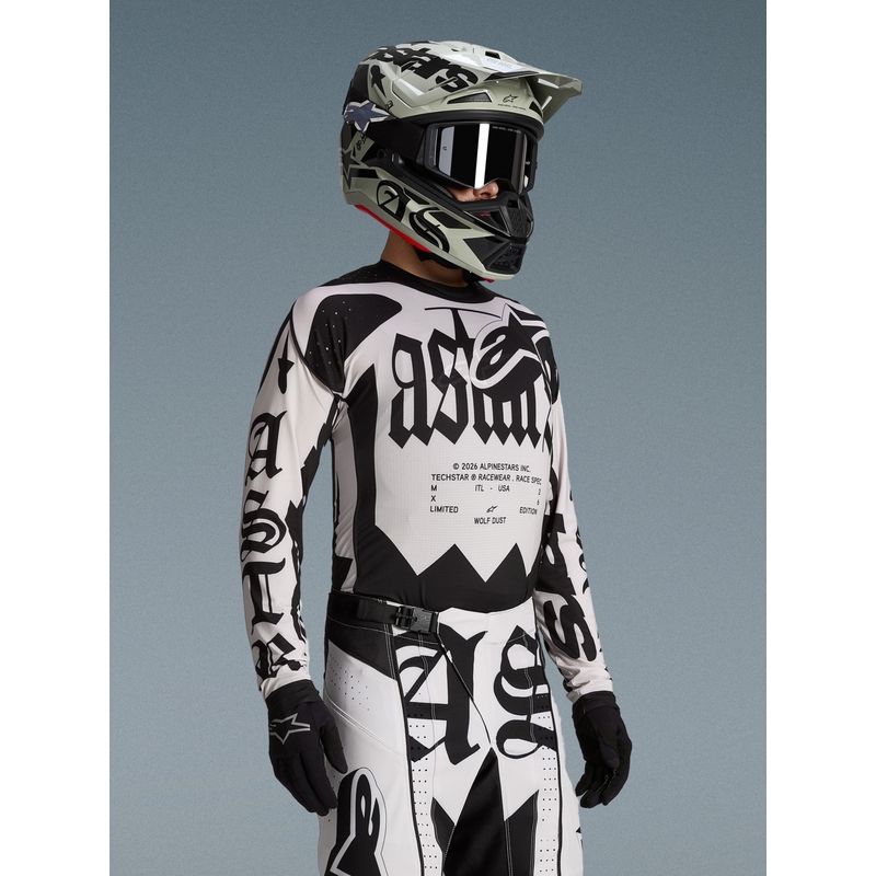 Motokros dres Alpinestars Techstar omejene izdaje Wolf Dust peščeno črne barve