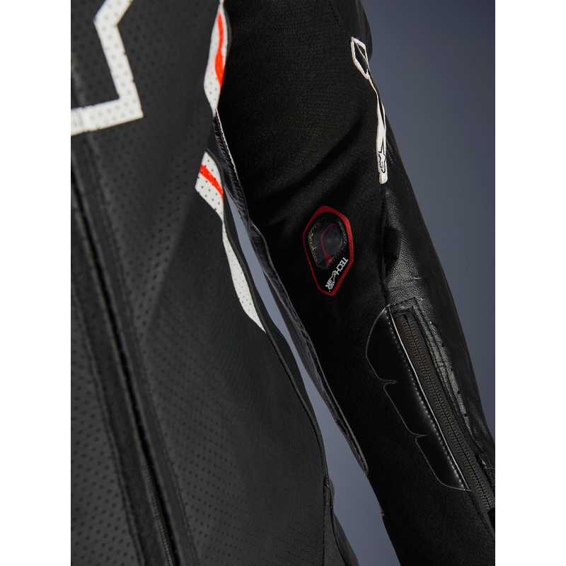 Alpinestars GP TECH V5 enodelni usnjen motoristični kombinezon črno-belo-fluo rdeč