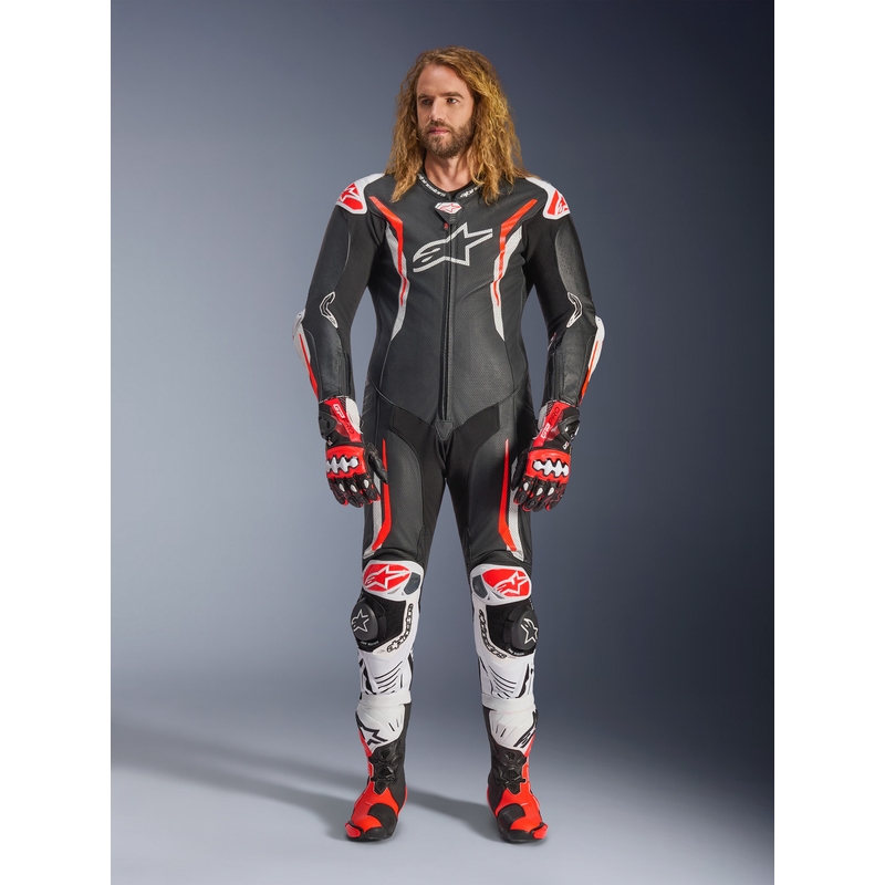 Alpinestars GP TECH V5 enodelni usnjen motoristični kombinezon črno-belo-fluo rdeč