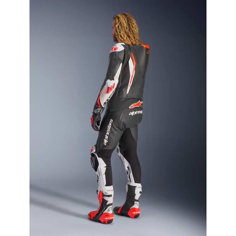 Alpinestars GP TECH V5 enodelni usnjen motoristični kombinezon črno-belo-fluo rdeč