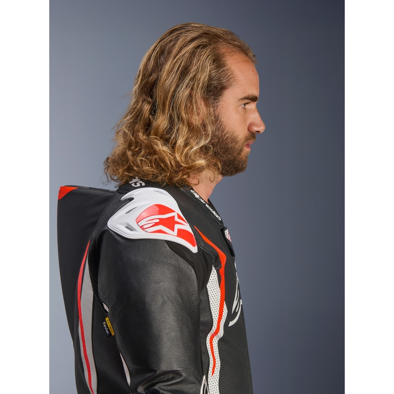Alpinestars GP TECH V5 enodelni usnjen motoristični kombinezon črno-belo-fluo rdeč