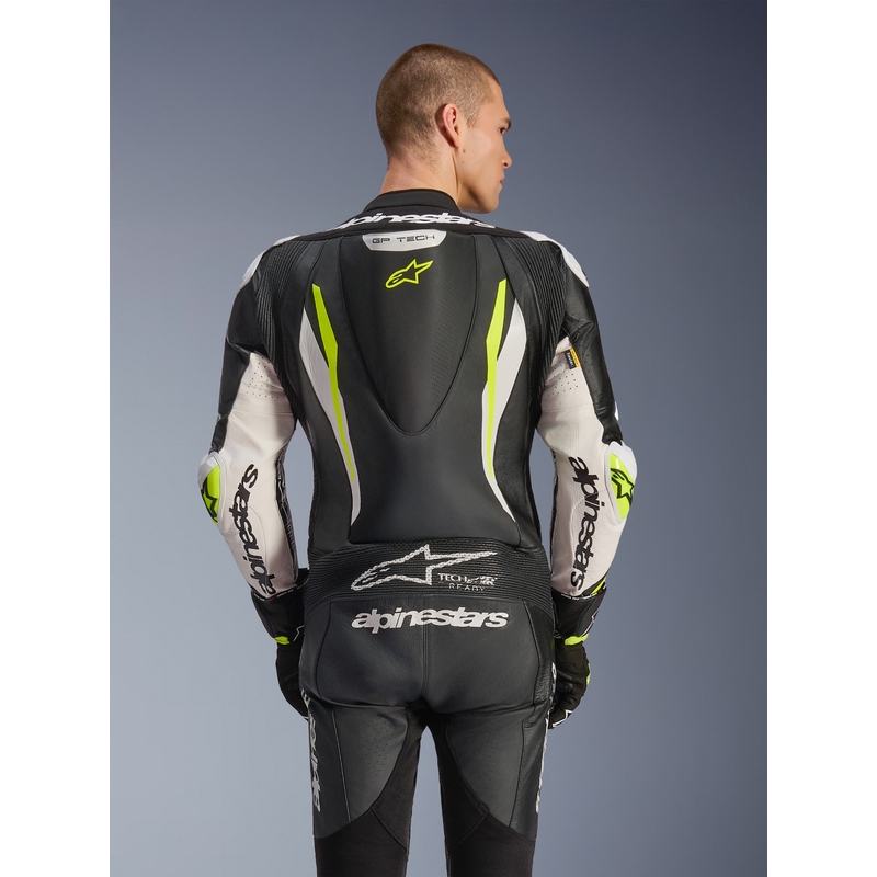 Alpinestars GP TECH V5 enodelni usnjen motoristični kombinezon črno-belo-fluo rumene barve