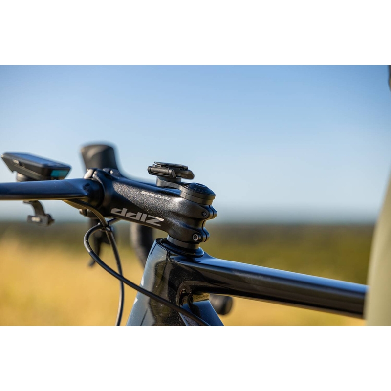 Nosilec pokrovčka krmila Quad Lock® črne barve