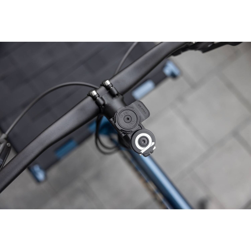 Nosilec pokrovčka krmila Quad Lock® črne barve